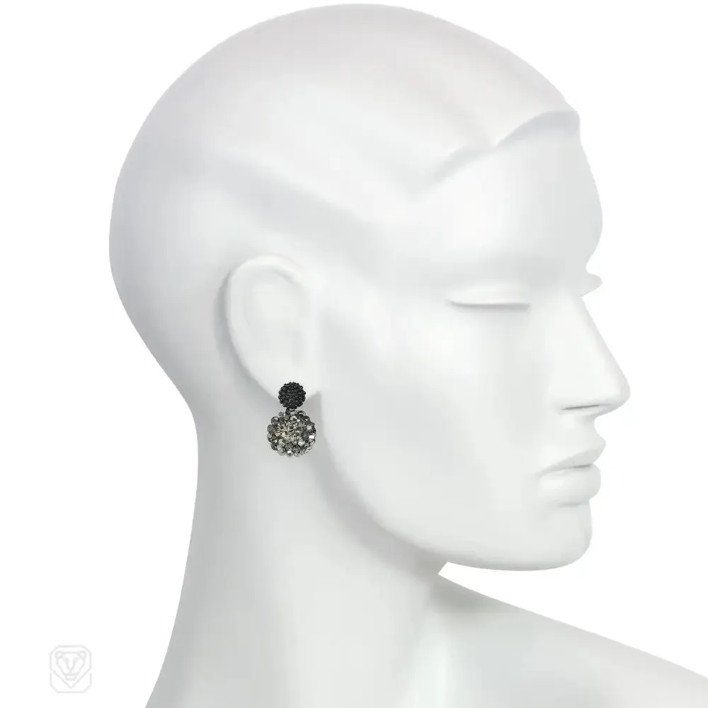 A pair of hand beaded double ball earrings with black glass ...